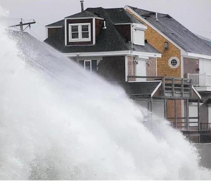 Storm surge over house